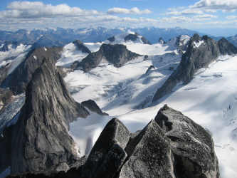 Snowpatch and Pigeon Spire as seen from the summit of Bugaboo Spire, Bugaboo Provincial Park, BC, Canada.