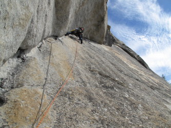 On the last pitch of Crescent Arch (5.10), Daff Dome, Tuolumne