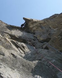 On the last pitch of Macadamia (5.9). Planters Valley, South Ghost, AB Canada. Photo by Nayden.