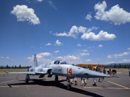 The F-5 tiger. Saw it land the day before while taxiing to the 29 runup area... very impressive! The pilot said this is the shortest runway he's landed at (especially considering the density altitude)