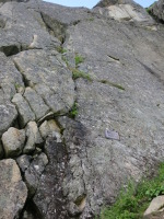 The start of “Toto” climb on the diamond (next to a memorial plaque)