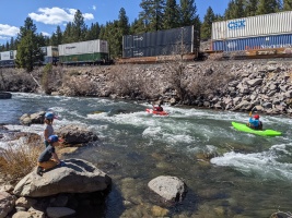 A train and kayakers... so many things to look at! :)