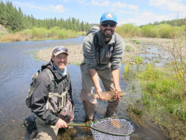 Squeezing the poor trout a little too hard... making sure he doesn't get away :)