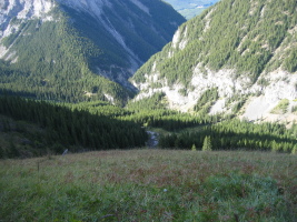 ascending steep grassy slopes