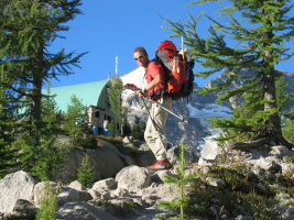 Dow with the Kain Hut behind him, about to leave.