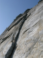 The double cracks on the left of the dihedral show the second pitch. The roof is part of pitch 3.