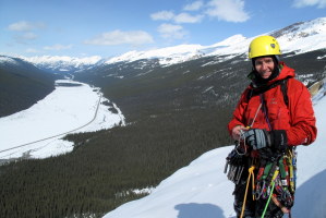Hedd-wyn on top of Curtain Call with the Banff-Jasper highway