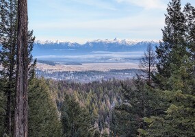 The Canadian Rockies are across the valley