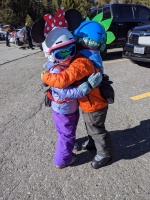 Sibling hugs in the June Mountain parking lot