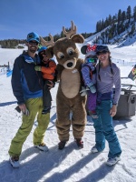 Bucky family portrait. Every Saturday, Bucky the mascot skis with the kids at 1:30pm!