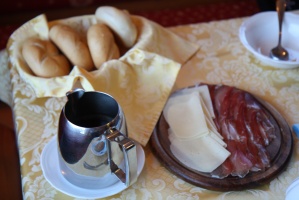 Breakfast essentials: bread, amazing coffee, and â€œspeck and cheeseâ€�