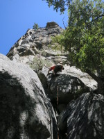 Short pitch to gain the 5.10d/5.11a pitches (visible on the left near the skyline)