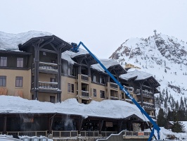 Professional roof shoveling. It was a big industry this winter!