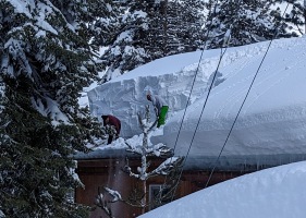 I thought there were around 6 feet of snow on our roof, but when the neighbor hired a crew to shovel due to an ice dam - I realized it was deceiving. So I got up there and started shoveling too... good thing, as two more rounds of big storms came!