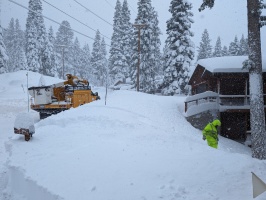 TDPUD workers snowshoeing down to find the power line issue