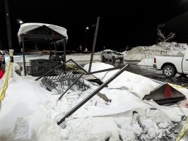 The shopping cart structure did not survive the snowload