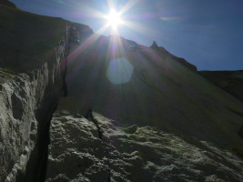 Karen starting up Airy Interlude, with another climber mid-way through. And sun in your eyes! :)