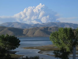 Forest fires + a large thunderhead over Lake Topaz