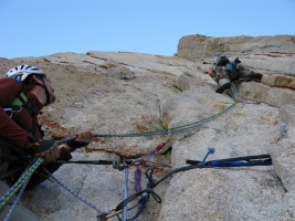 Pavel cranking on the start of the dihedral pitch (we had to move belay up)