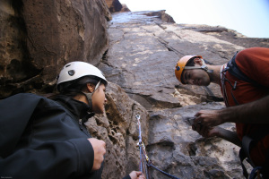 Chilling at the belay ledge, photo by Meder