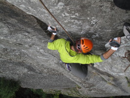 Starting the face traverse to gain the crack (5.10d)