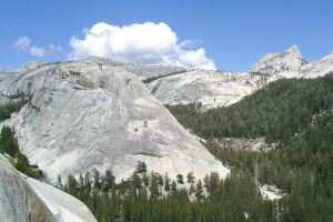 Pywiack Dome and Cathedral Peak, with a cool cloud