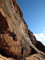 Dow belaying me as I start 'Living on the Edge', photo by Stacy